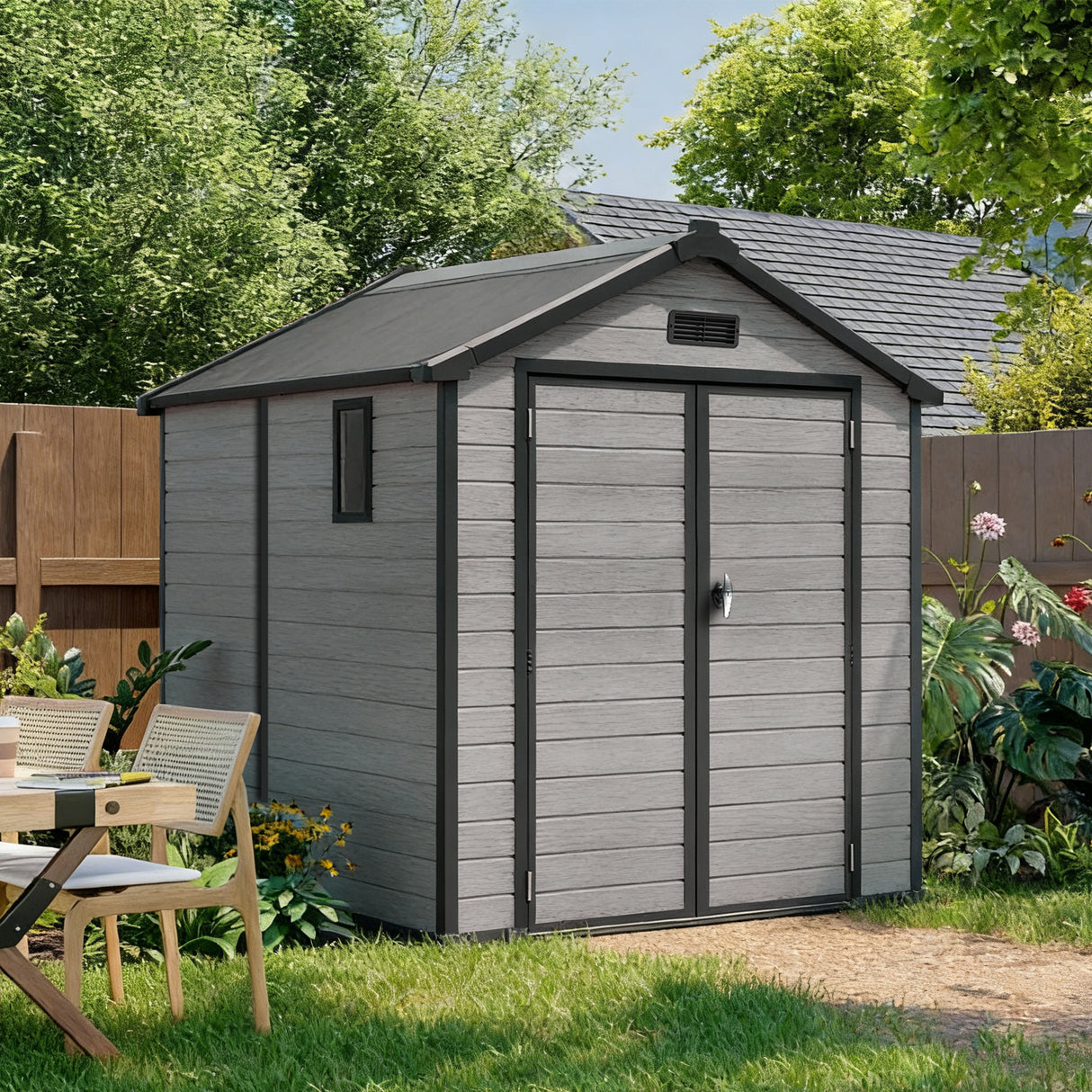 Patioslife YardVault 6x6ft resin garden storage shed with built-in floor, double doors, lock and side window in a green backyard