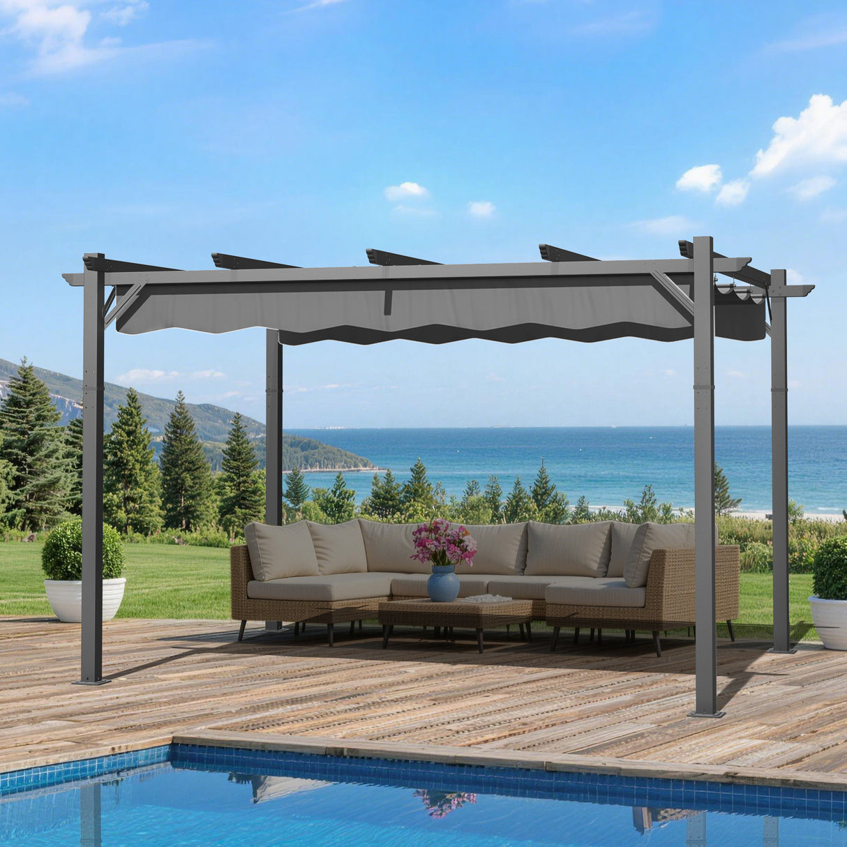 10x13 ft Charcoal Patioslife Atlantic retractable pergola with adjustable canopy over outdoor lounge seating on a poolside deck with ocean and mountain backdrop