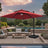 Red patio umbrella over outdoor furniture,patioslife,Poolside,Outdoor Leisure Area,Outdoor Kitchen or Dining Area,Garden Pathway,Rooftop Terrace,Sun Shading & Light Contro,Space Definition,LED