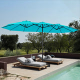 Patioslife Horizon 15 x 9 ft Turquoisedouble-sided patio umbrella shading two poolside loungers on a sunny terrace