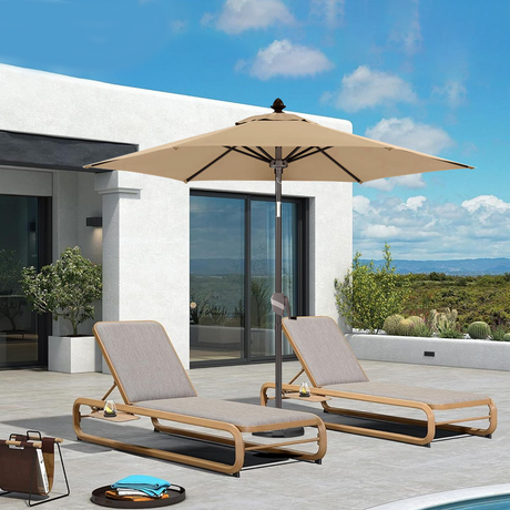 Patioslife 8ft cream patio umbrella over two loungers on a modern patio beside a white house and pool