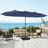 Patioslife Horizon 15 x 9 ft navy blue double-sided patio led light umbrella over a modern outdoor sofa set on an ocean-view deck