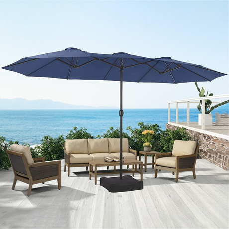 Patioslife Horizon 15 x 9 ft navy blue double-sided patio led light umbrella over a modern outdoor sofa set on an ocean-view deck