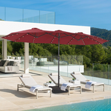 Patioslife Horizon 15 x 9 ft red double-sided patio umbrella shading a wicker outdoor lounge set beside an infinity pool and ocean view